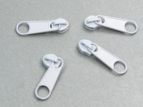 Suwak nonlock #3 metalowy biały - 100 szt Suwak nonlock #3 metalowy biały - 100 szt